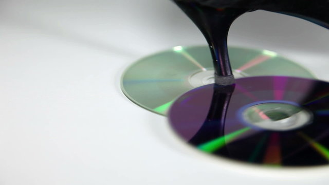 Shot of a womans leg in high heels steping on cd