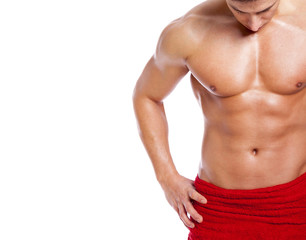 Fit man in towel, isolated on white background