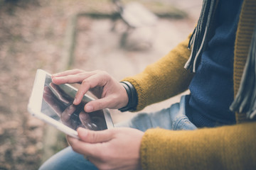 young handsome caucasian man in autumn park