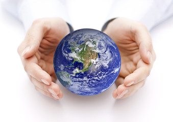 Earth in hands. Earth image provided by Nasa.