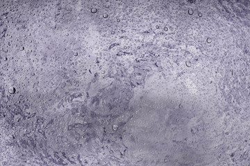 Water drops on glass and defocus nature flowers chrome backgroun