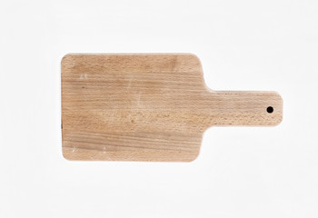 Rustic wooden cutting board on a white background