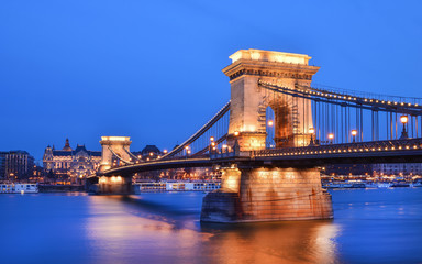 The evening view of the Chain bridge, the Danube and Buda side f