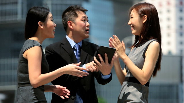 Team Asian Chinese Business People Congratulating Each Other 