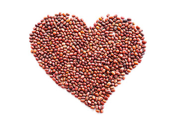 Heart of red beans on a white background