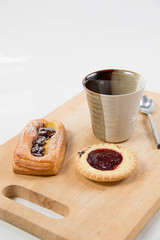 Cup of coffee and danish pastry.