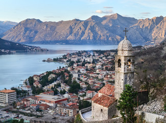 Fototapeta na wymiar The view over Kotor, Montenegro, the old church, the bay and the