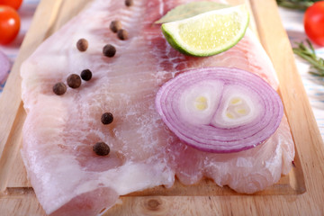 Pangasius fillet with herb, spices and vegetables