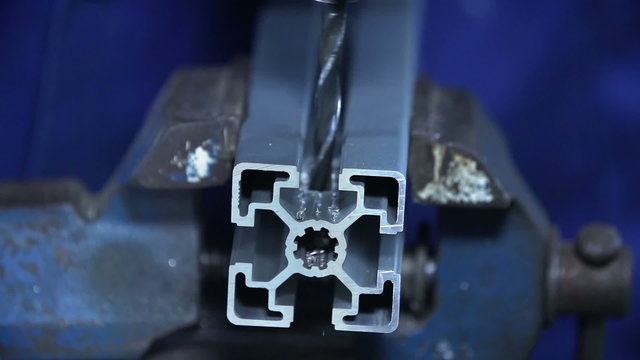 Drilling through iron pipe
