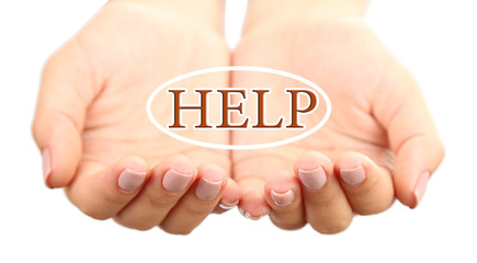 Female hands and word HELP isolated on white