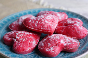Cookies in form of heart in plate