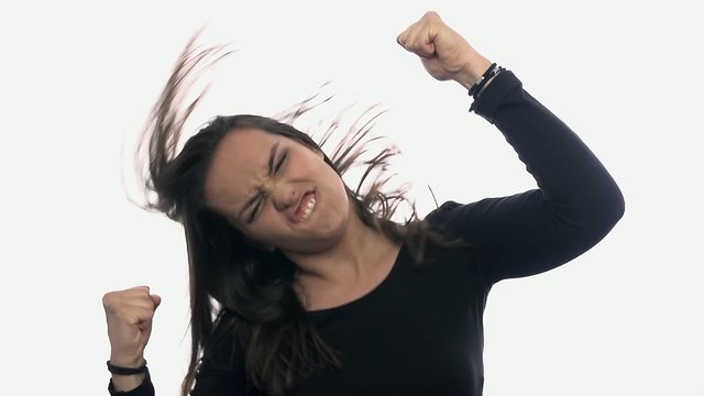 Woman over-excited on white background slow motion