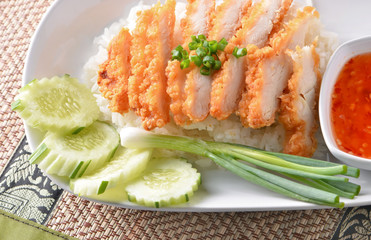 RICE STEAMED WITH CHICKEN SOUP or Khao Man Gai is a pretty commo