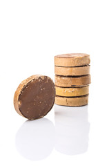 Round palm sugar over white background