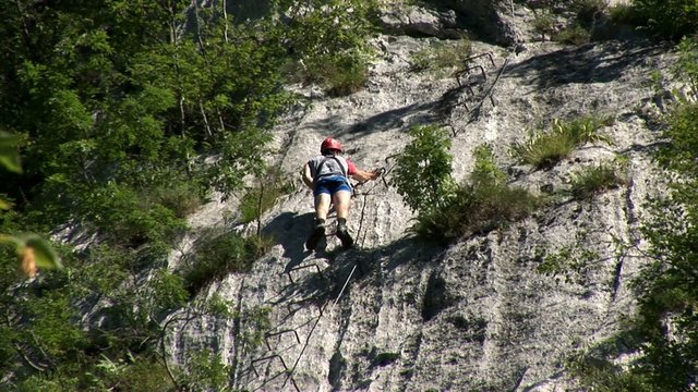 Man climbing down the ledder in the bedrock