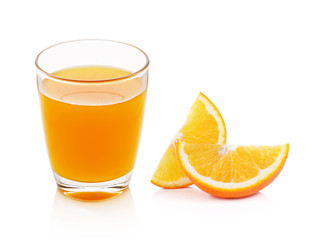 Fresh orange and glass with juice on white background.