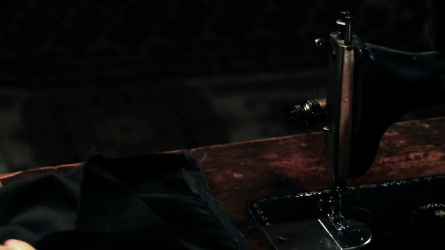 Shot of an old tailor in his workshop