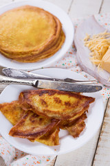 Pancakes or crepes with cheese
