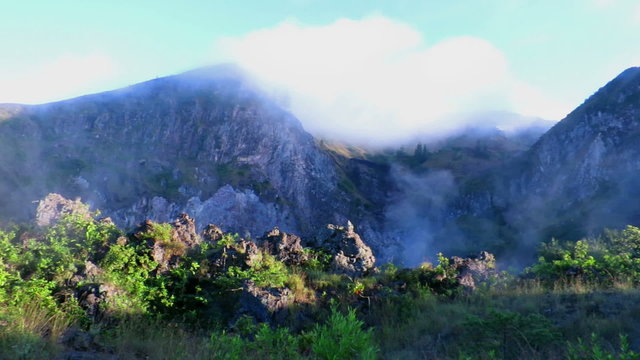 View over active volcano on top of mount Batur, Bali