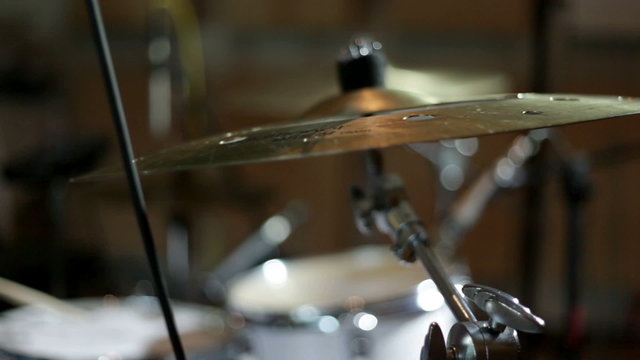 close up shot of musican playing drums