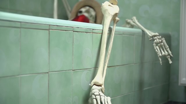 Skeleton taking a bath
