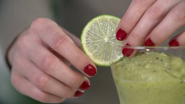 Adding lime to green-looking smoothie