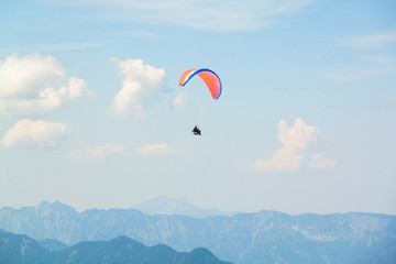 Fototapeta na wymiar Paraplane in the sky above the Alps