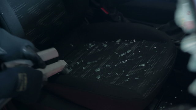 Sucking up glass pieces scattered inside of a car
