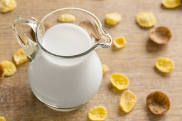 Healthy breakfast with jug of milk