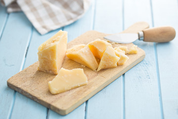 parmesan cheese on cutting board