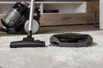 Traditional vacuum cleaner versus a modern one