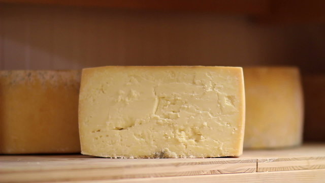 HD1080p: Close up of woman's hand storaging cheese