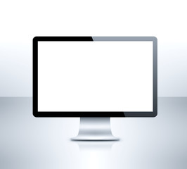 Modern LCD computer monitor on reflective background