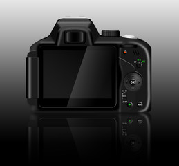 Digital SLR camera (dSLR) with a reflection on a table