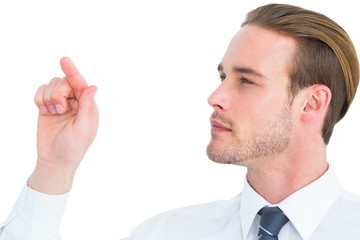 Concentrated businessman pointing with his finger