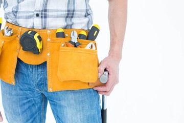 Technician with tool belt around waist
