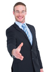 Businessman smiling and offering his hand