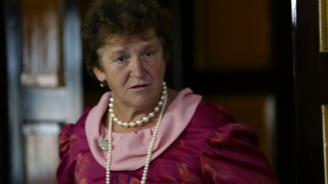 Old lady angrily talking back to the mayor