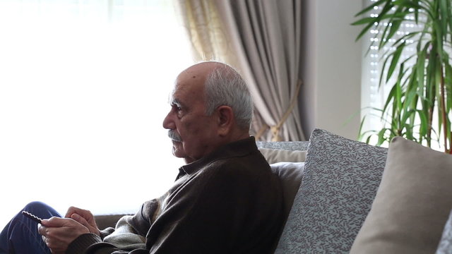 Senior Man Watching Television