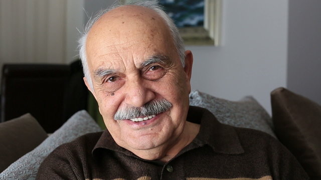 smiling senior man at home