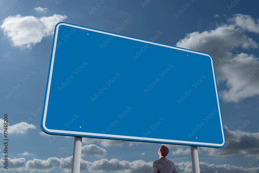 Poster composite image of businessman standing with hands on hips