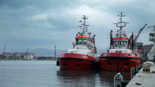 two big towboats waiting in the harbor