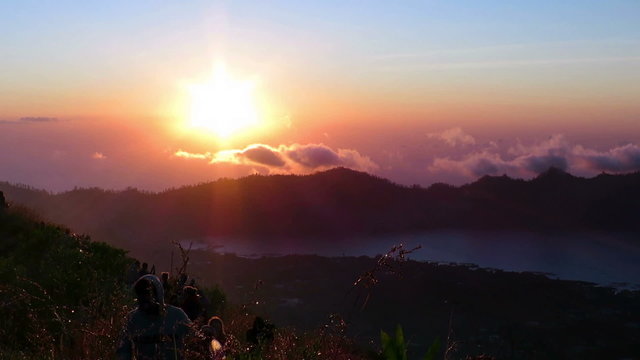 Beautiful sunrise from mount Batur vulcano with a view over Batur lake, Bali