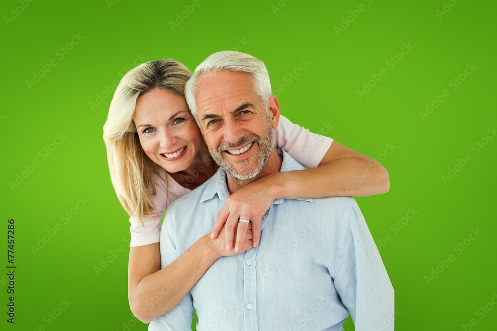 Aufkleber smiling couple embracing and looking at camera