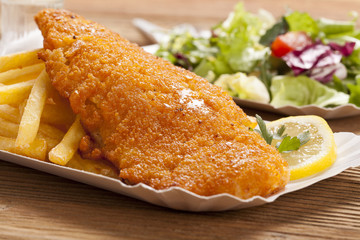 Fried fish and chips on a paper tray