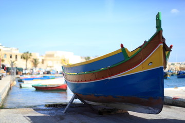 Fototapeta na wymiar Nautical Vessel in the Marsaxlokk Harbor, Malta