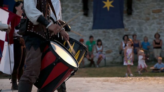 Men creating an atmosphere with their drumming