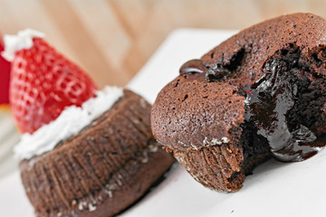 Chocolate cake with strawberry in the shape of hat Christmas