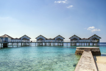 Fototapeta na wymiar Beach bungalows, Maldives