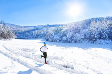 Man jogging in winter nature